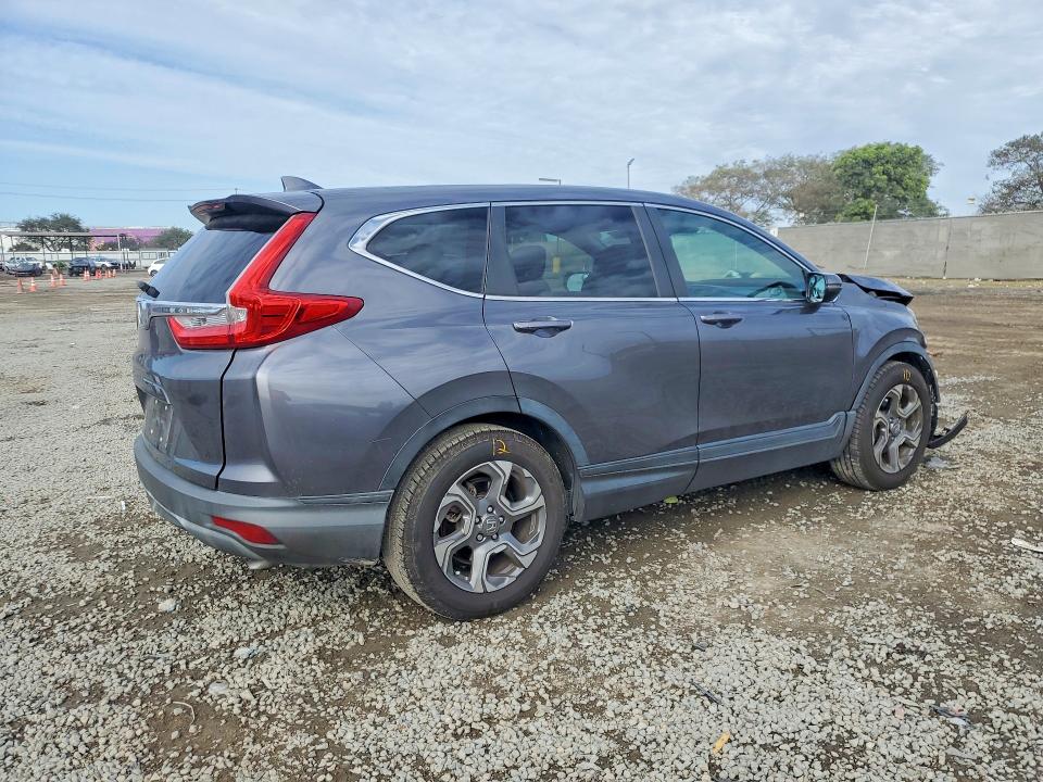 Photo 3 from auction – 2019 HONDA CR-V with VIN 5J6RW1H50KA000342