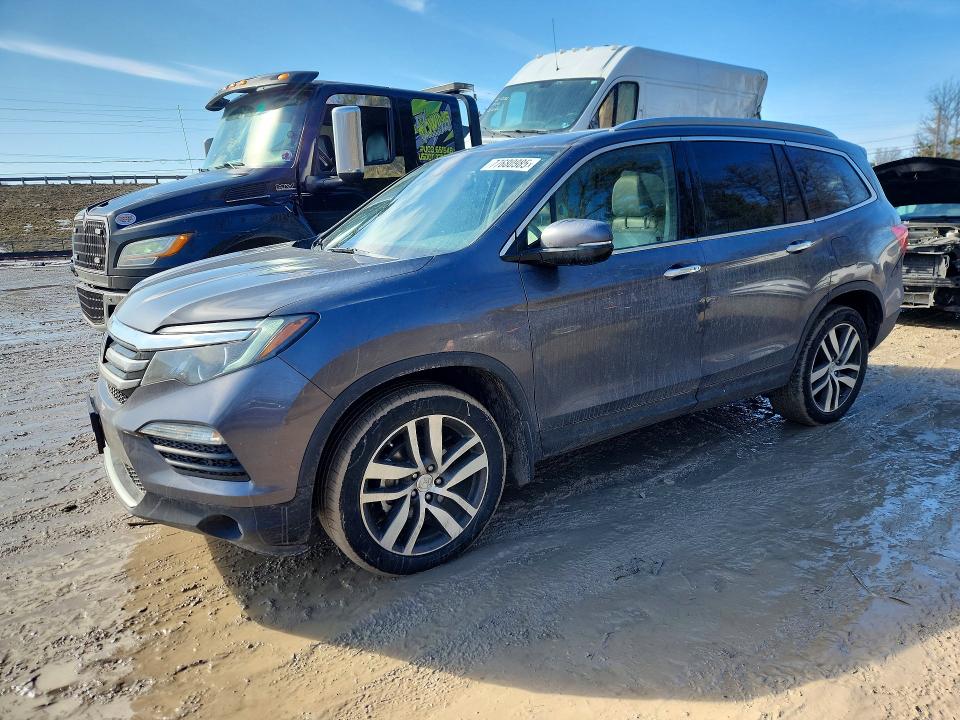 HONDA PILOT TOUR 2017 z numerem VIN 5FNYF6H92HB029083 - Zdjęcie z aukcji