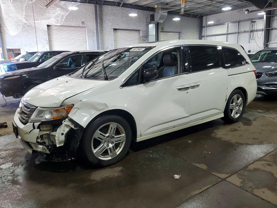 HONDA ODYSSEY 2012 مع رقم تعريف المركبة 5FNRL5H98CB034479 - صورة من المزاد