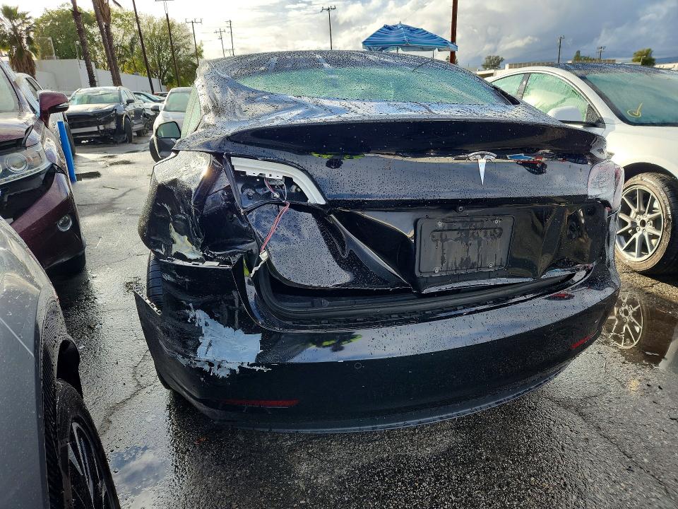 Photo 2 from auction – 2022 TESLA MODEL 3 with VIN 5YJ3E1EA7NF288484