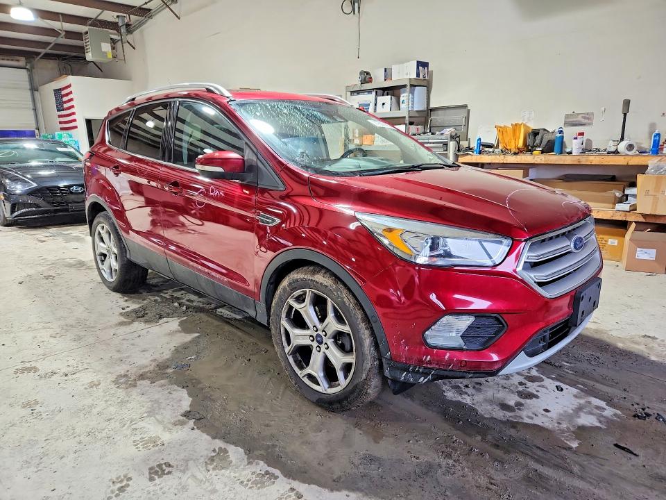 Photo 4 from auction – 2018 FORD ESCAPE TIT with VIN 1FMCU9J93JUB68451