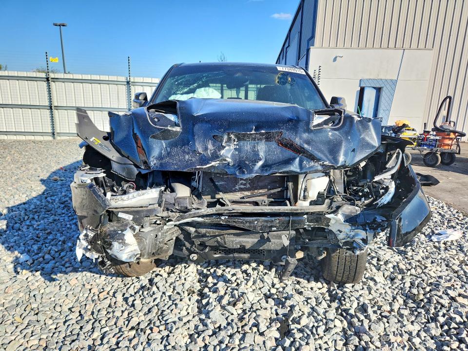 Photo 5 from auction – 2021 RAM 1500 with VIN 1C6SRFJT2MN803015