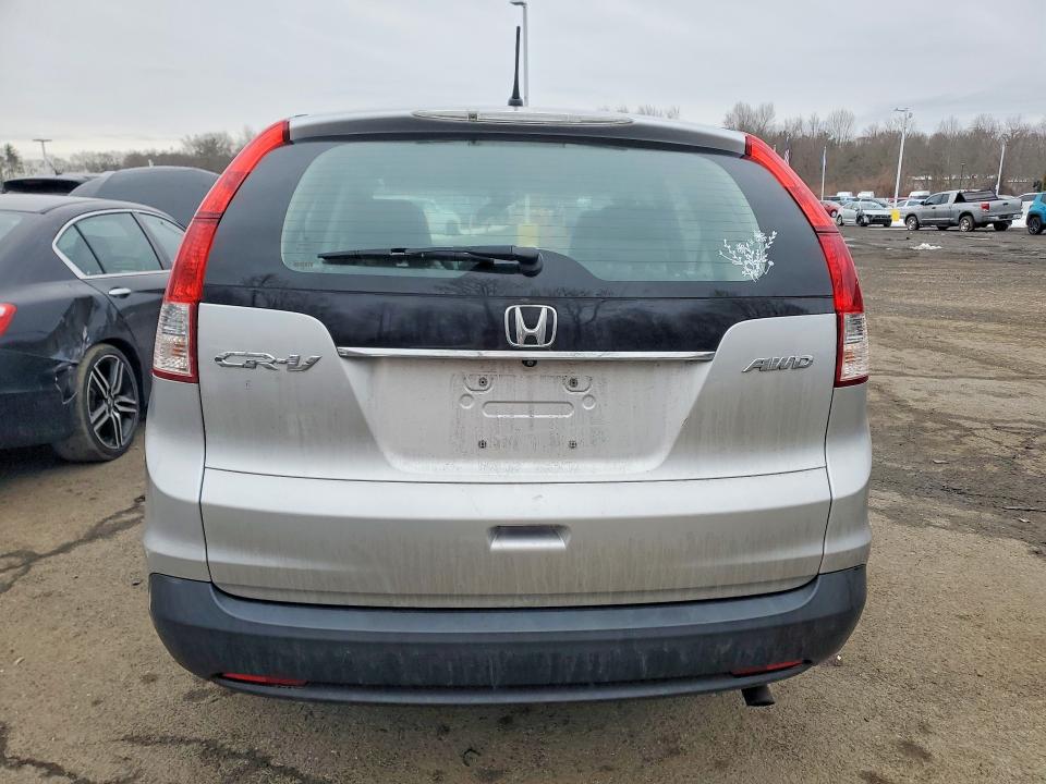 Photo 6 from auction – 2013 HONDA CR-V with VIN 2HKRM4H39DH687361