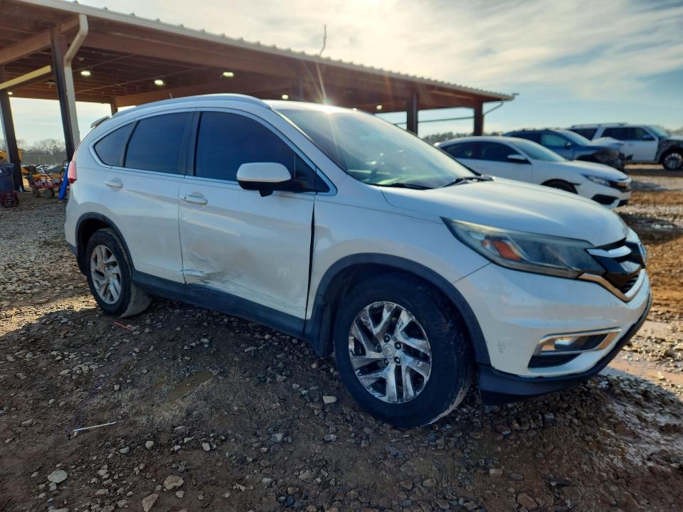 Photo 4 from auction – 2016 HONDA CR-V with VIN 5J6RM3H71GL015494