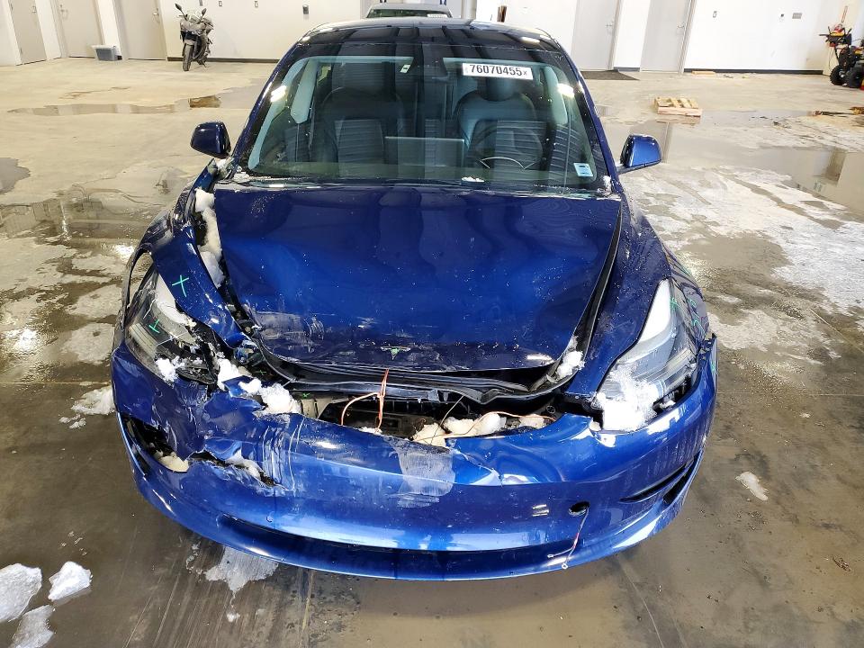 Photo 5 from auction – 2022 TESLA MODEL 3 with VIN 5YJ3E1EAXNF308906