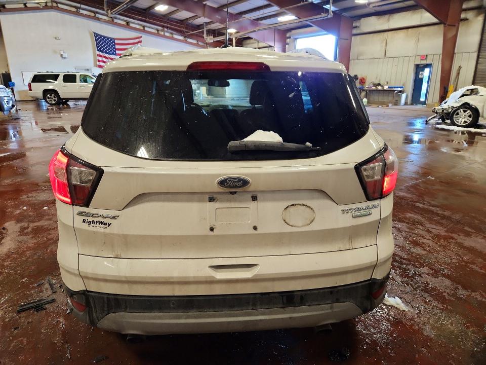 Photo 6 from auction – 2017 FORD ESCAPE with VIN 1FMCU0J97HUE91214