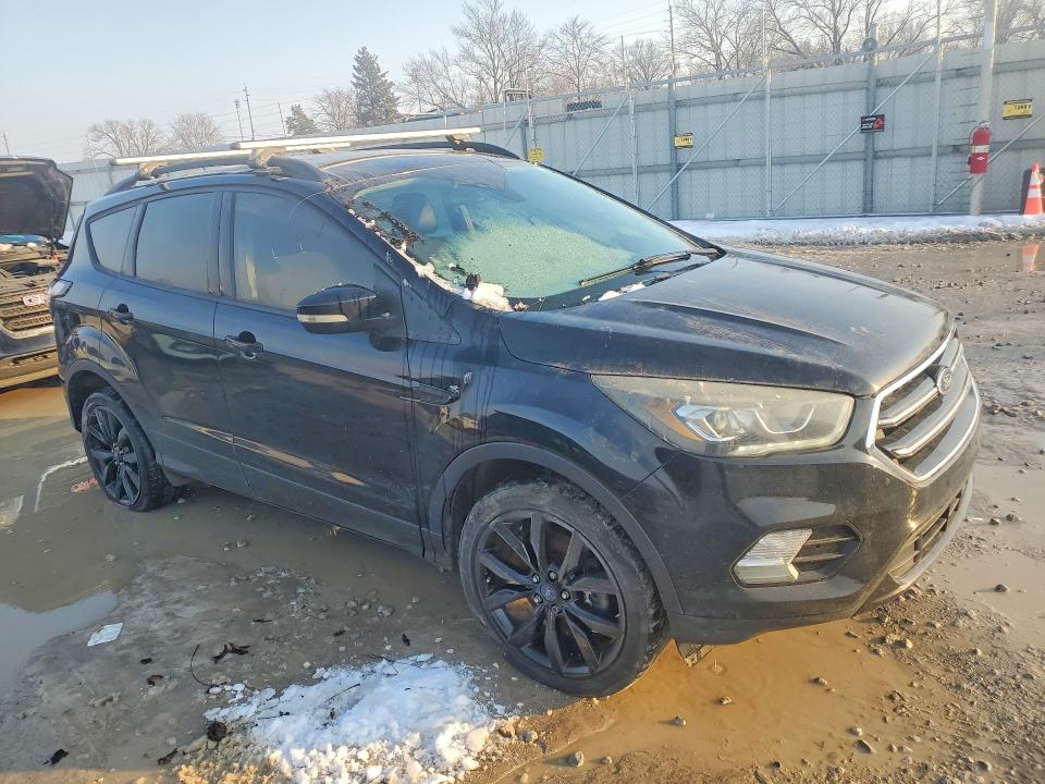 Photo 4 from auction – 2017 FORD ESCAPE TIT with VIN 1FMCU9J93HUC22227