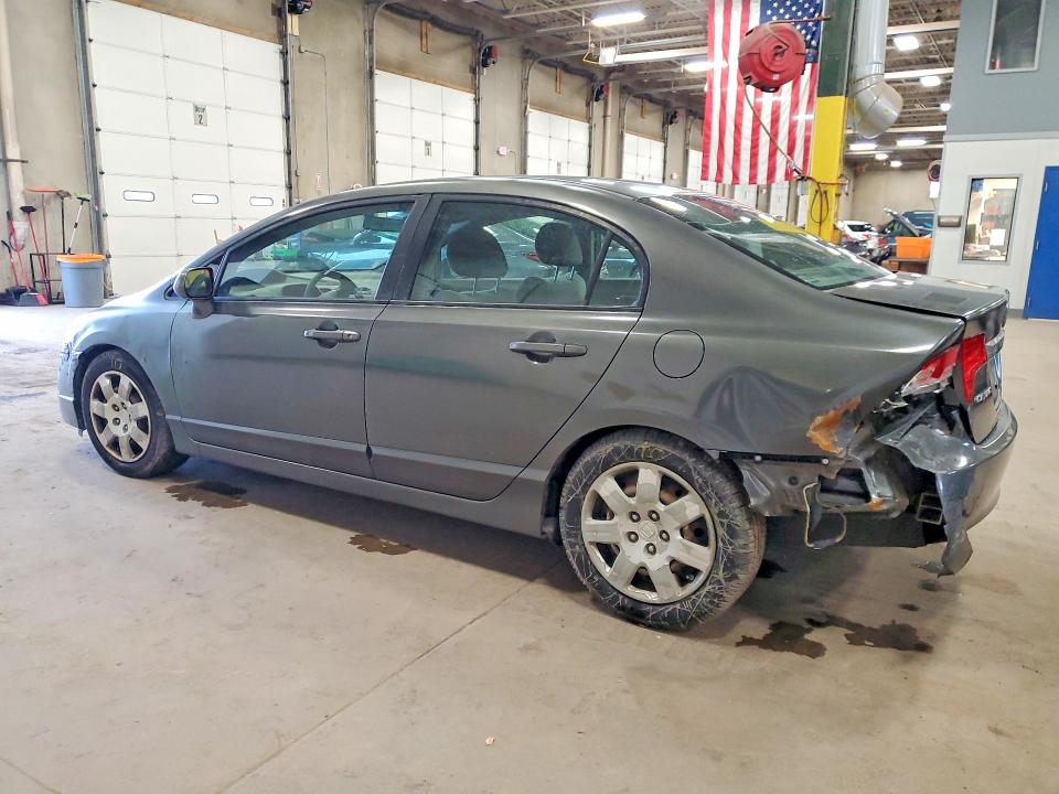 Photo 2 from auction – 2010 HONDA CIVIC with VIN 19XFA1F56AE043265