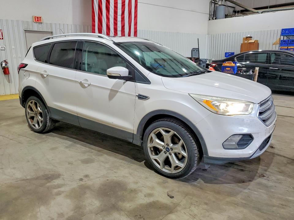 Photo 4 from auction – 2017 FORD ESCAPE TIT with VIN 1FMCU0J91HUC92854