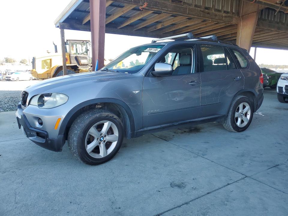 BMW X5 2010 with VIN 5UXFF0C54ALJ98984 - Photo from auction