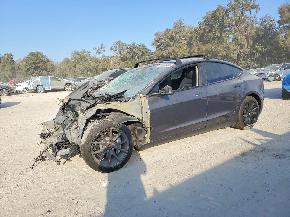 TESLA MODEL 3 2023 with VIN 5YJ3E1EA7PF648775 - Photo from auction