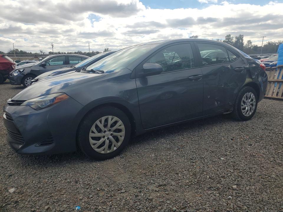 TOYOTA COROLLA 2017 with VIN 5YFBURHE1HP698850 - Photo from auction
