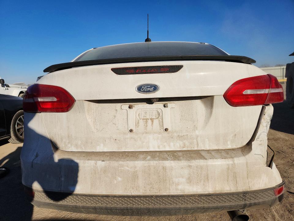 Photo 6 from auction – 2015 FORD FOCUS S with VIN 1FADP3E24FL220084