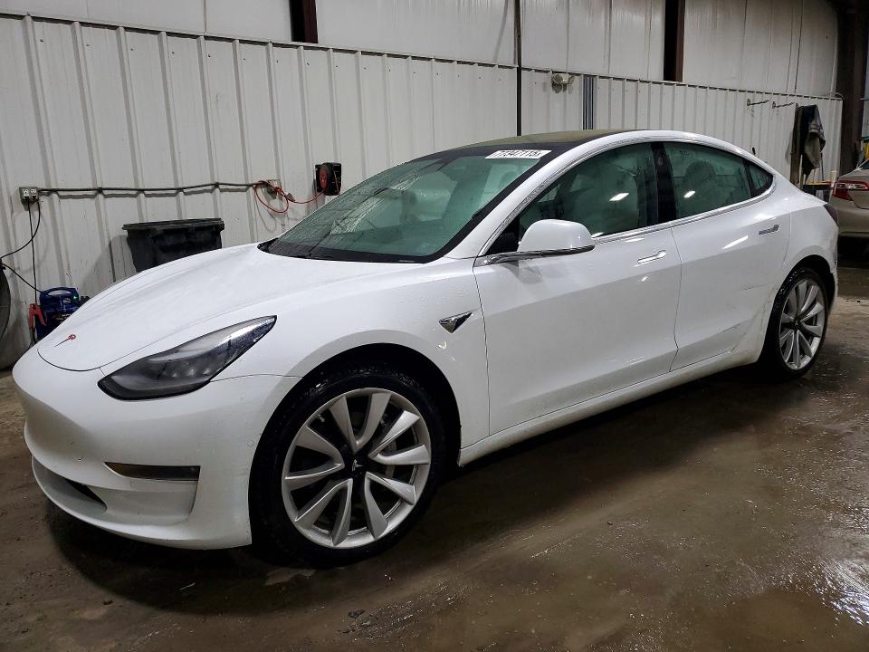 TESLA MODEL 3 2018 with VIN 5YJ3E1EB6JF101240 - Photo from auction