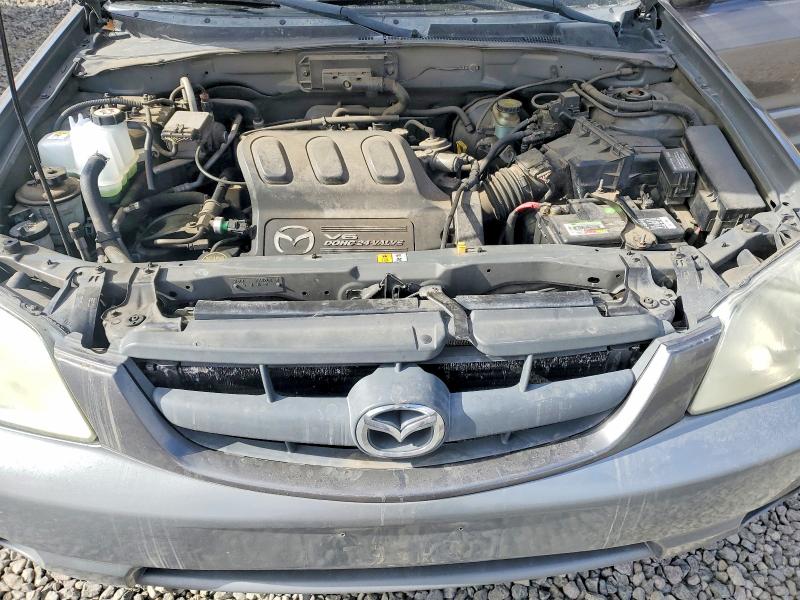 Photo 12 from auction – 2002 MAZDA TRIBUTE with VIN 4F2YU08102KM03620