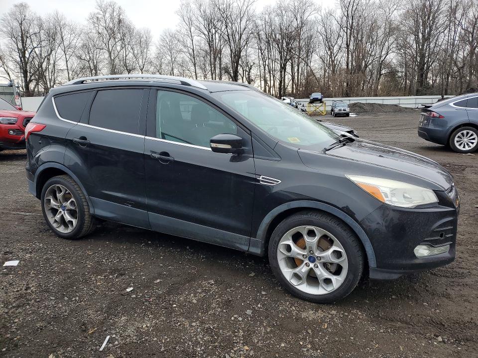 Photo 4 from auction – 2014 FORD ESCAPE TIT with VIN 1FMCU0J91EUA26701