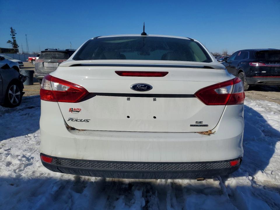 Photo 6 from auction – 2013 FORD FOCUS with VIN 1FADP3F22DL308630