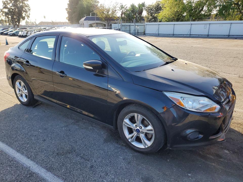 Photo 4 from auction – 2014 FORD FOCUS with VIN 1FADP3F20EL366205