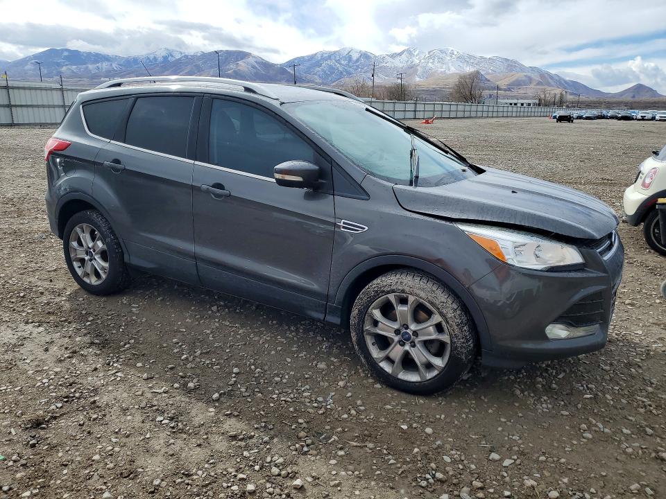 Photo 4 from auction – 2016 FORD ESCAPE TIT with VIN 1FMCU0JX0GUA11611