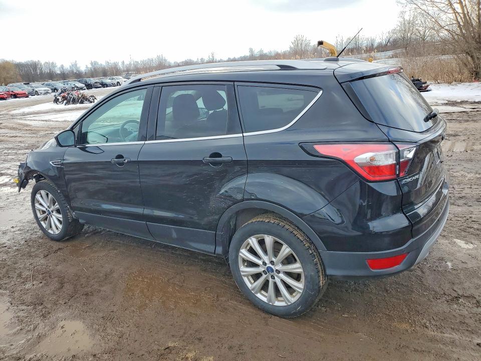Photo 2 from auction – 2017 FORD ESCAPE TIT with VIN 1FMCU0JD3HUD17418