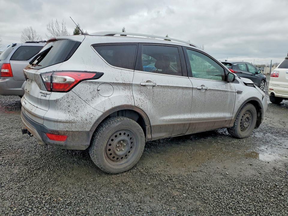 Photo 3 from auction – 2017 FORD ESCAPE with VIN 1FMCU9J97HUC02854