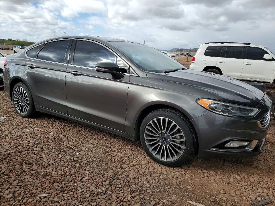 Photo 4 from auction – 2018 FORD FUSION TIT with VIN 3FA6P0D97JR188358