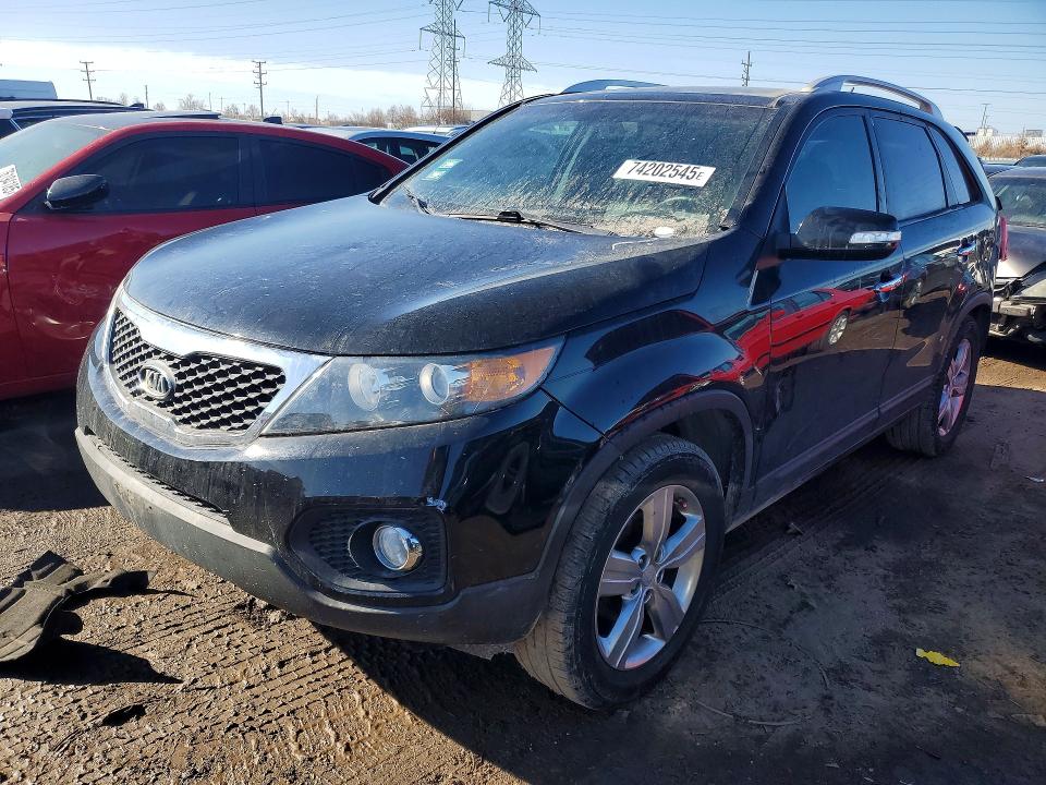 KIA SORENTO 2012 with VIN 5XYKU4A23CG208862 - Photo from auction