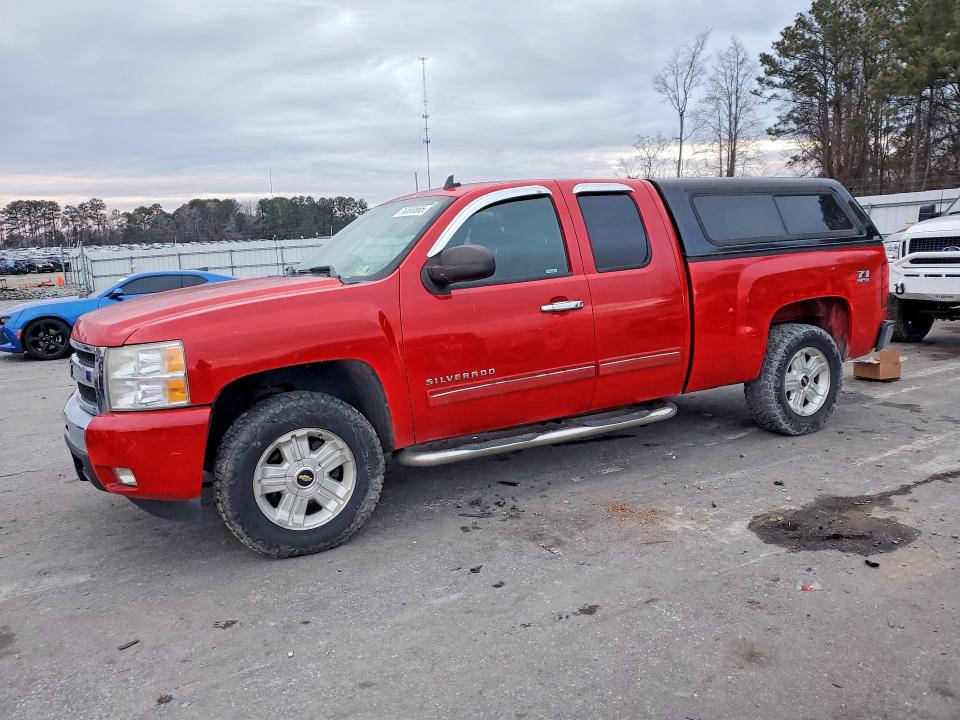 CHEVROLET SILVERADO 2011 with VIN 1GCRKSE35BZ352344 - Photo from auction