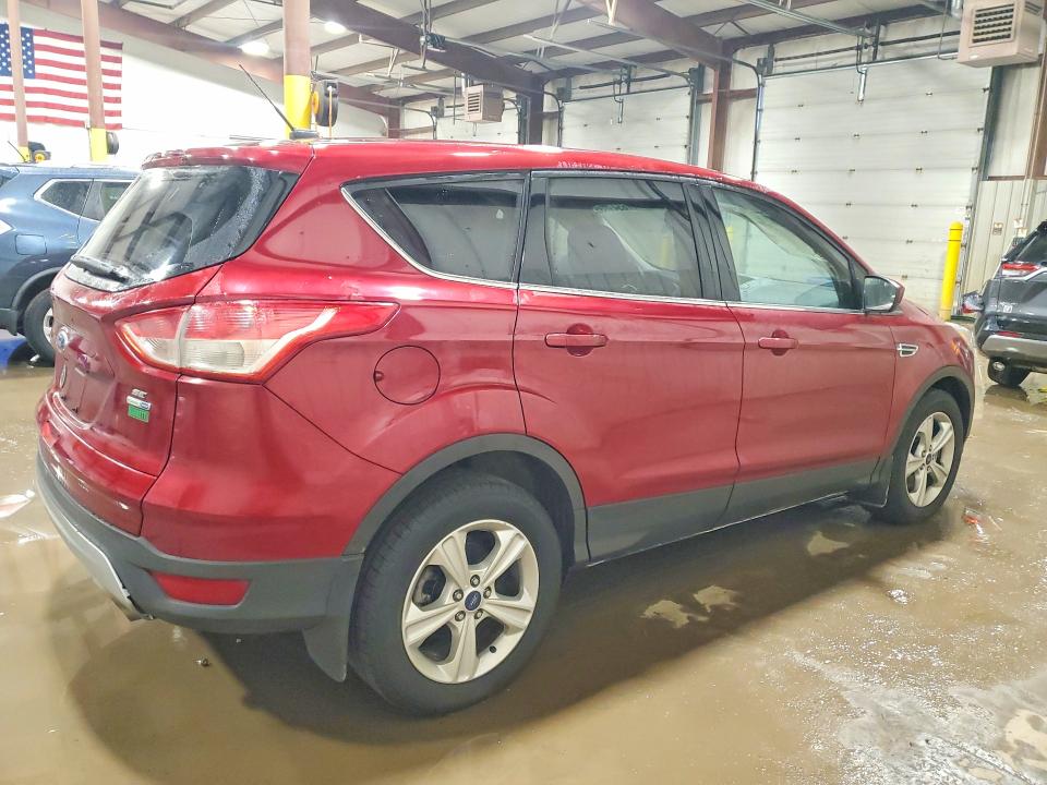 Photo 3 from auction – 2016 FORD ESCAPE with VIN 1FMCU9GX7GUB51294