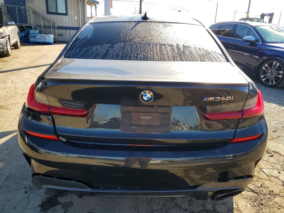 Photo 6 from auction – 2021 BMW M340I with VIN 3MW5U7J05M8B64516