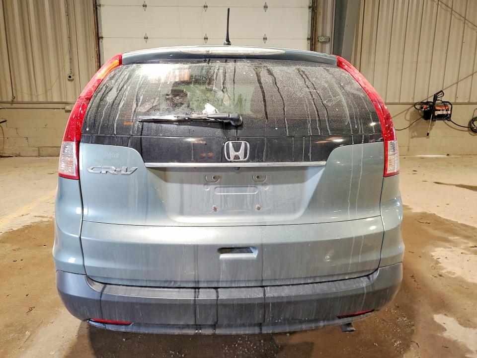 Photo 6 from auction – 2012 HONDA CR-V LX with VIN 5J6RM3H37CL020092