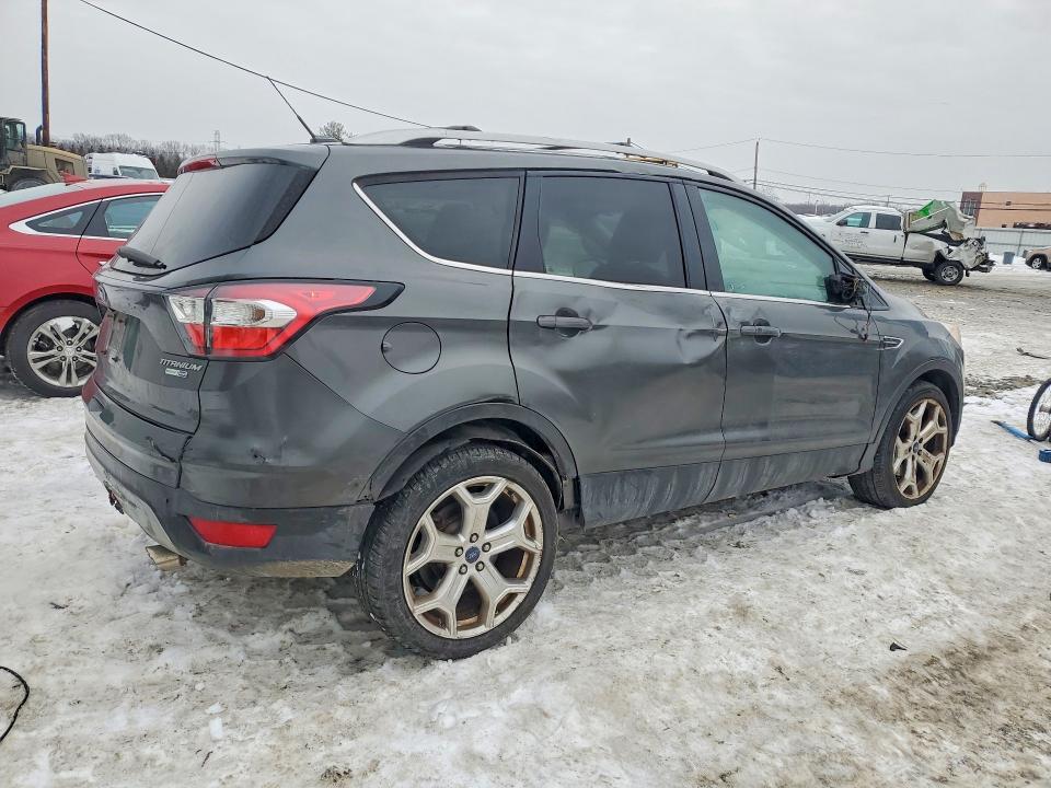 Photo 3 from auction – 2017 FORD ESCAPE TIT with VIN 1FMCU9J96HUF09285