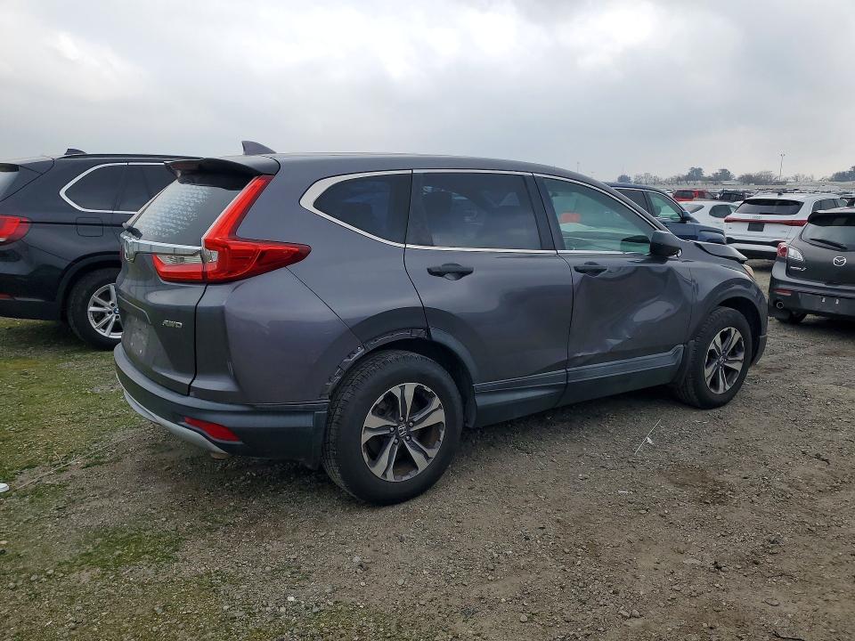 Photo 3 from auction – 2017 HONDA CR-V with VIN 2HKRW6H39HH200266