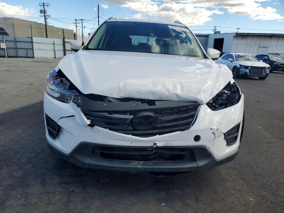 Photo 5 from auction – 2016 MAZDA CX-5 SPORT with VIN JM3KE2BYXG0716379