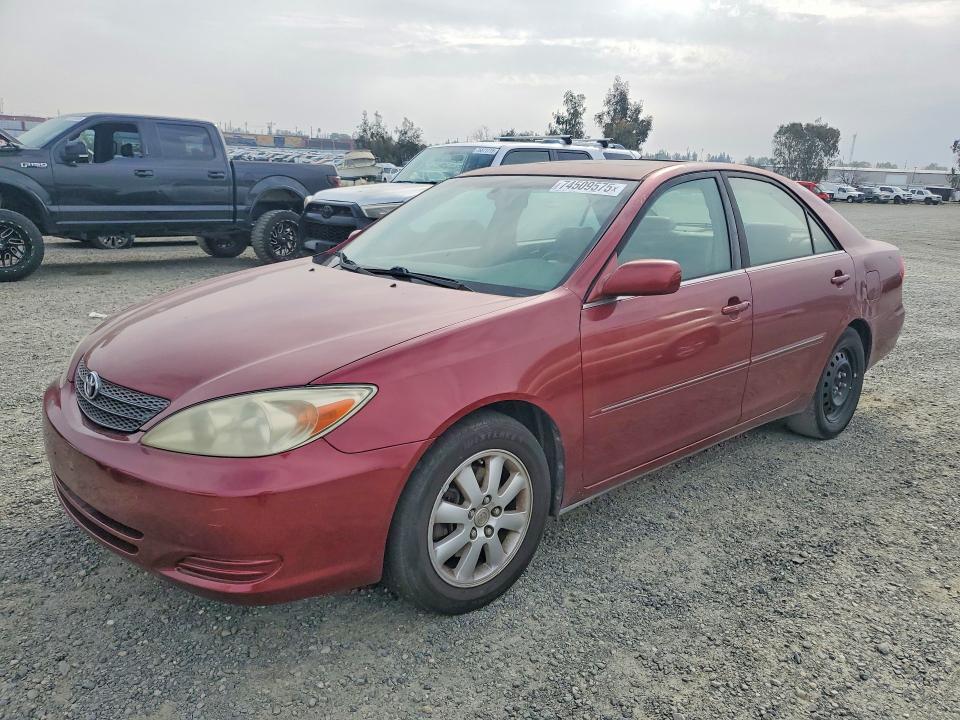 TOYOTA CAMRY 2002 with VIN JTDBF30K320074168 - Photo from auction