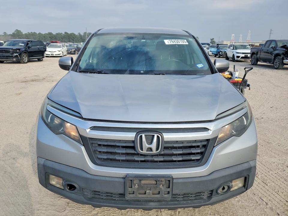 Photo 5 from auction – 2017 HONDA RIDGELINE with VIN 5FPYK2F52HB002607