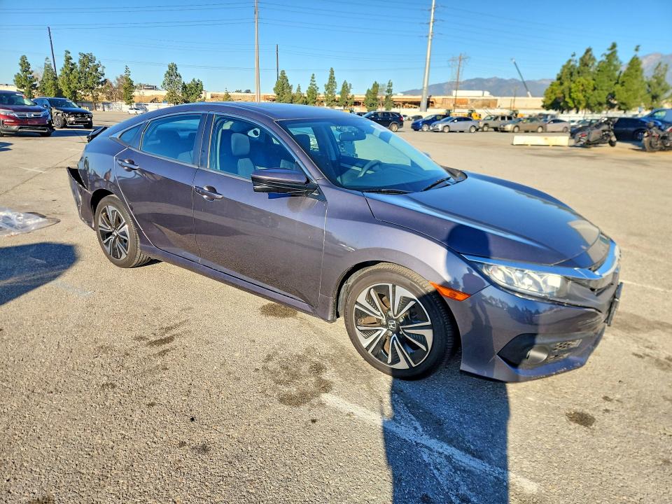 Photo 4 from auction – 2017 HONDA CIVIC with VIN 2HGFC1F35HH641646