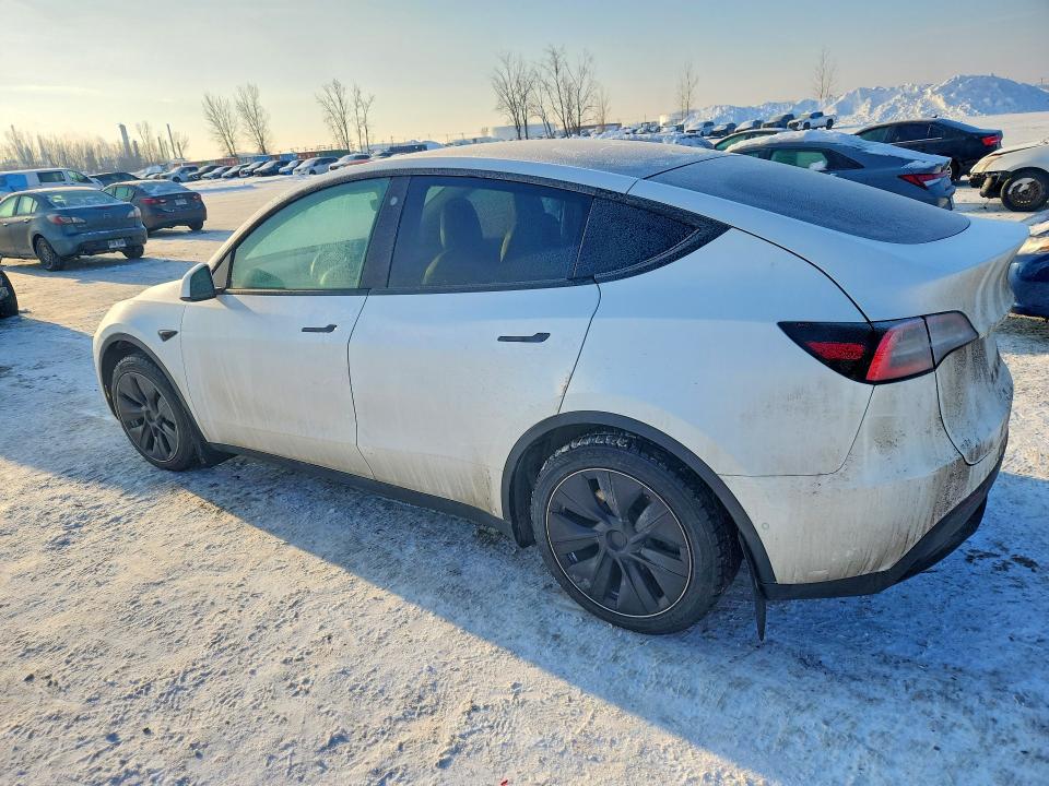 Photo 2 from auction – 2021 TESLA MODEL Y with VIN 5YJYGDED9MF110926