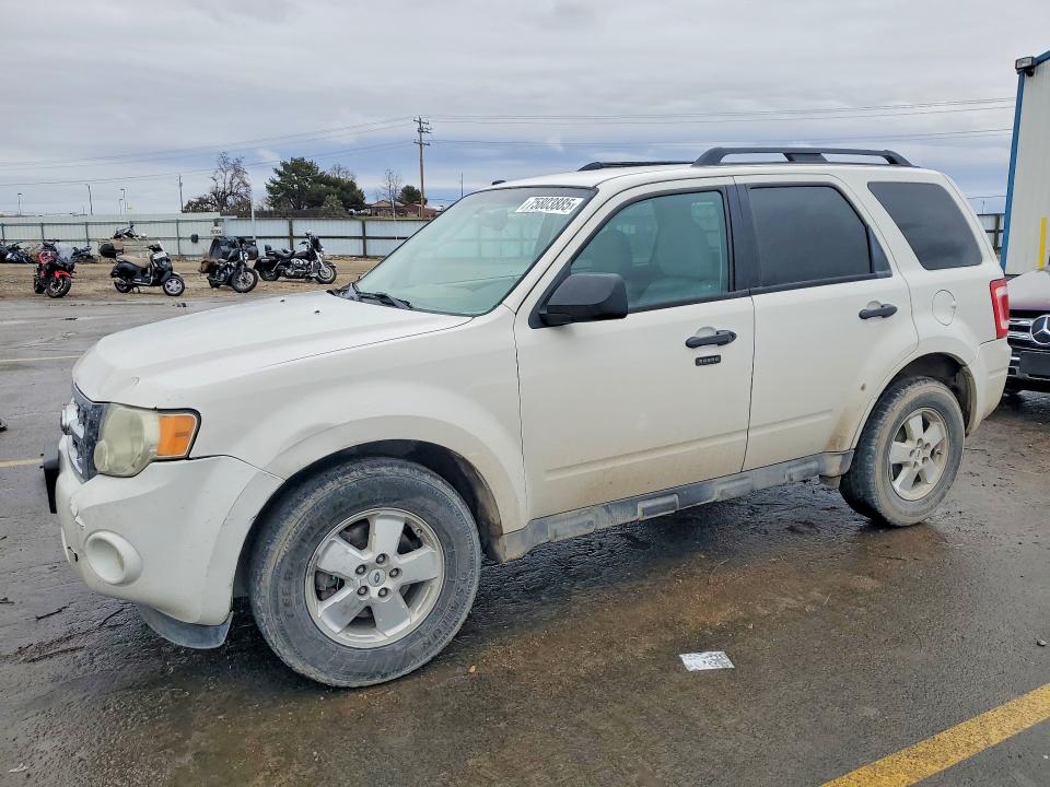 FORD ESCAPE 2011 with VIN 1FMCU9DG9BKB35347 - Photo from auction