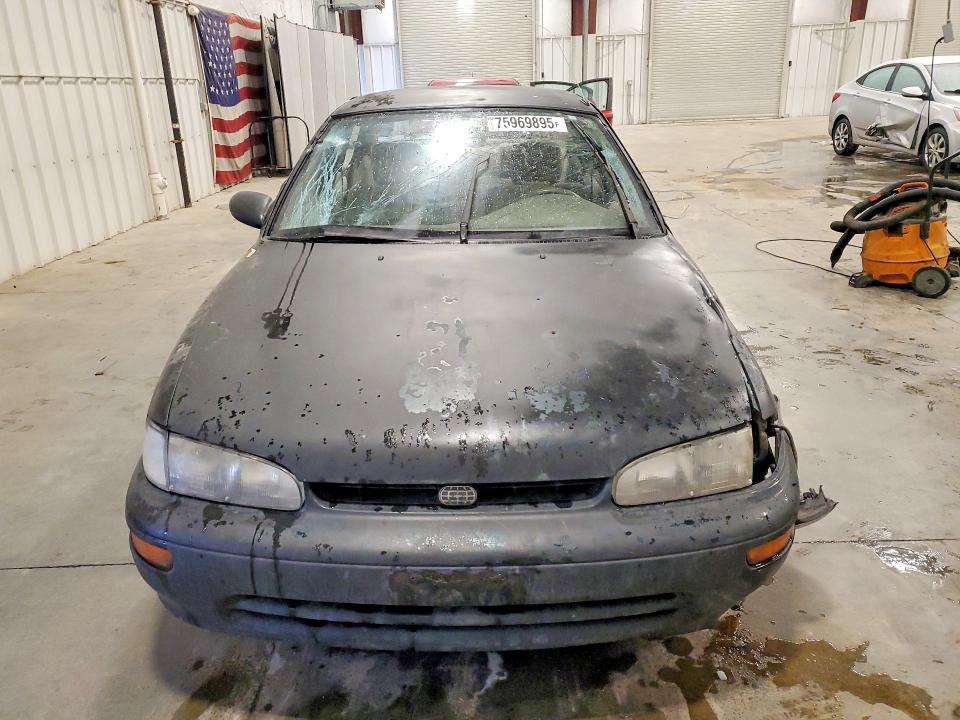 Снимка 5 от търг – 1997 GEO PRIZM с VIN 1Y1SK5266VZ446007