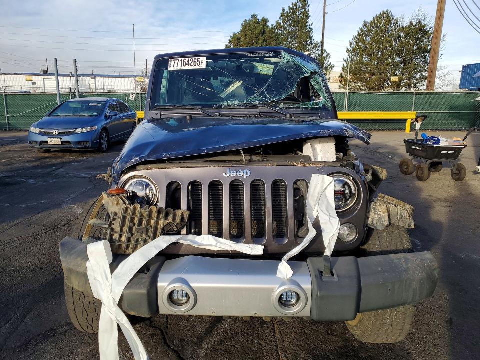 Photo 5 from auction – 2014 JEEP WRANGLER with VIN 1C4AJWBG9EL228390