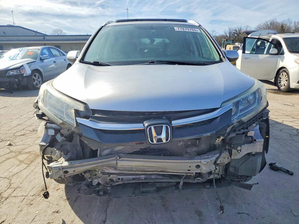 Photo 5 from auction – 2015 HONDA CR-V with VIN 2HKRM3H7XFH520443
