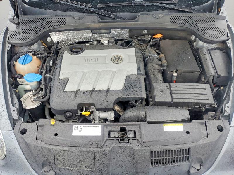 Photo 11 from auction – 2014 VOLKSWAGEN BEETLE with VIN 3VW5L7AT3EM817849