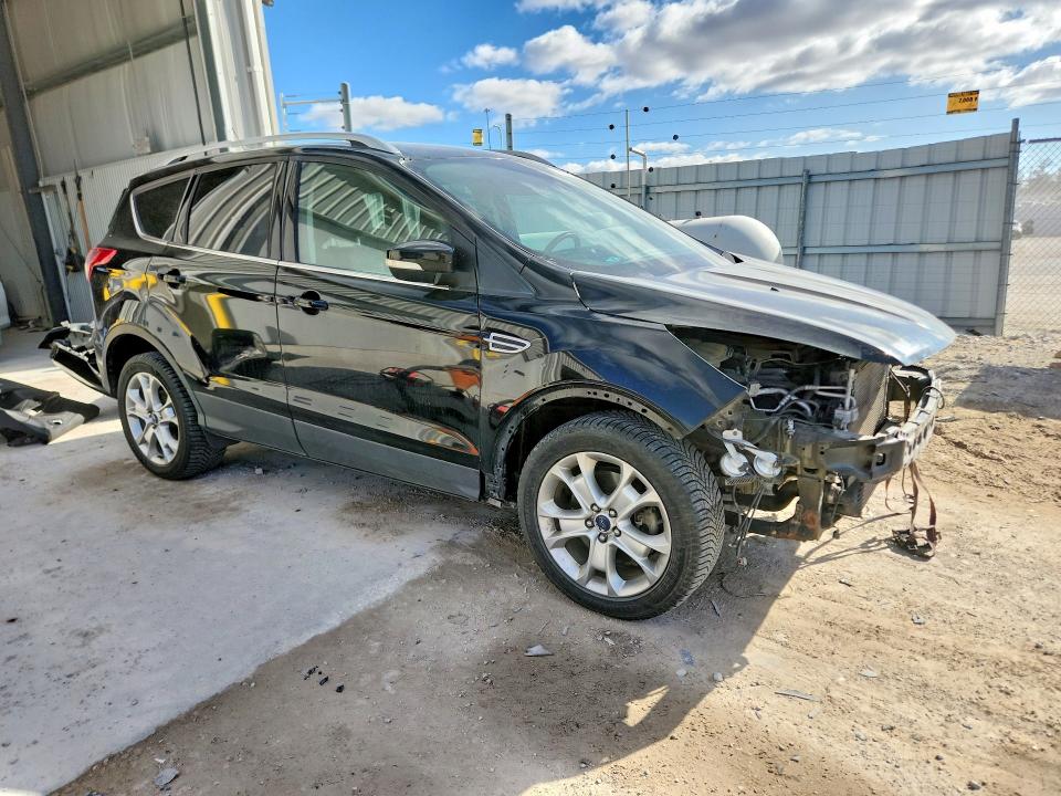 Photo 4 from auction – 2016 FORD ESCAPE with VIN 1FMCU9JX3GUC58299