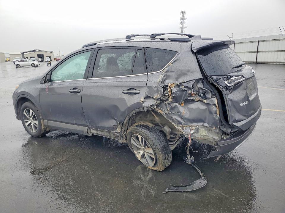 Photo 2 from auction – 2018 TOYOTA RAV4 with VIN 2T3WFREV0JW506250