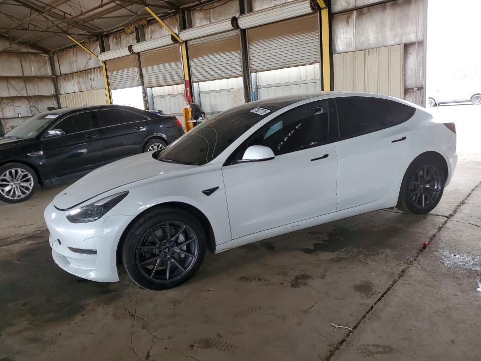 TESLA MODEL 3 2023 with VIN 5YJ3E1EA0PF484723 - Photo from auction