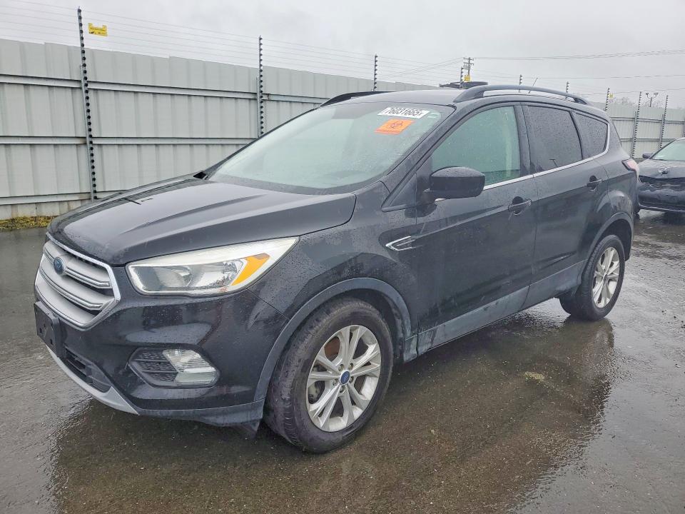 FORD ESCAPE 2018 with VIN 1FMCU0GD0JUC36969 - Photo from auction