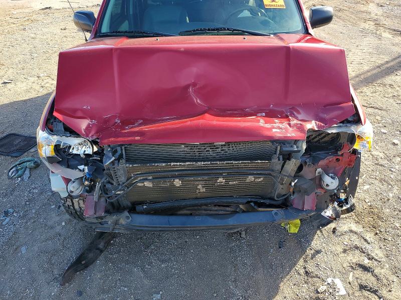 Photo 12 from auction – 2005 FORD ESCAPE with VIN 1FMYU03145KE10402