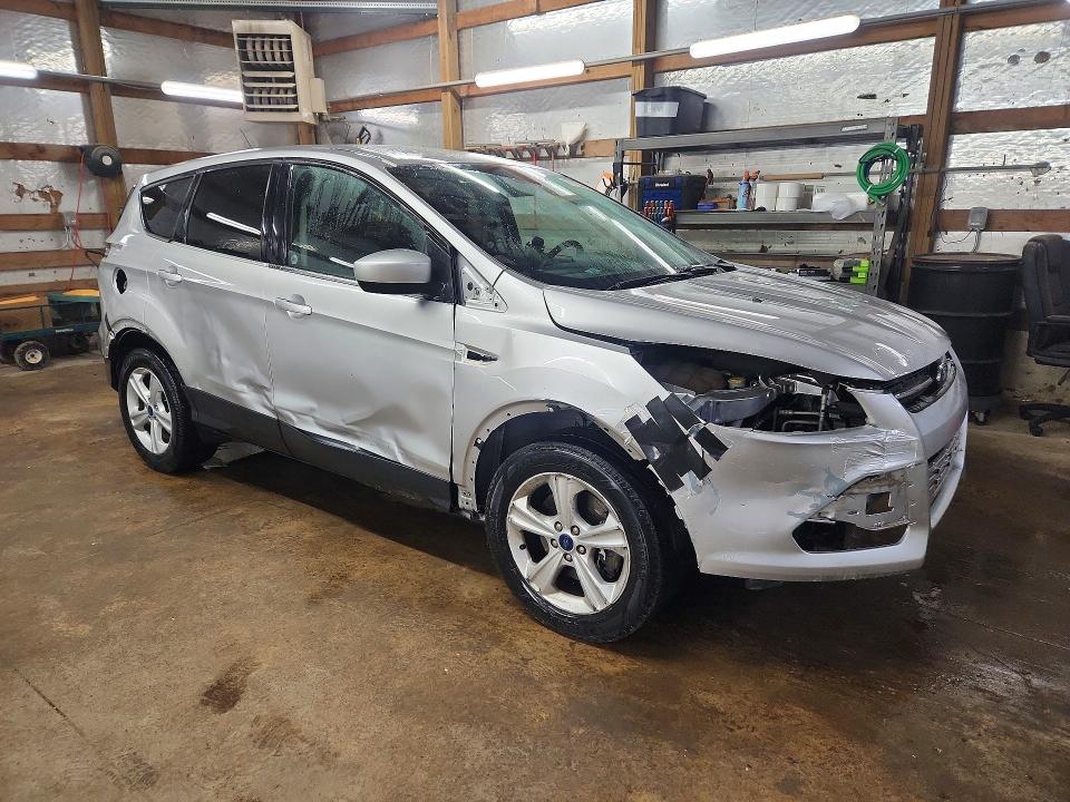 Photo 4 from auction – 2015 FORD ESCAPE with VIN 1FMCU9G92FUC73206