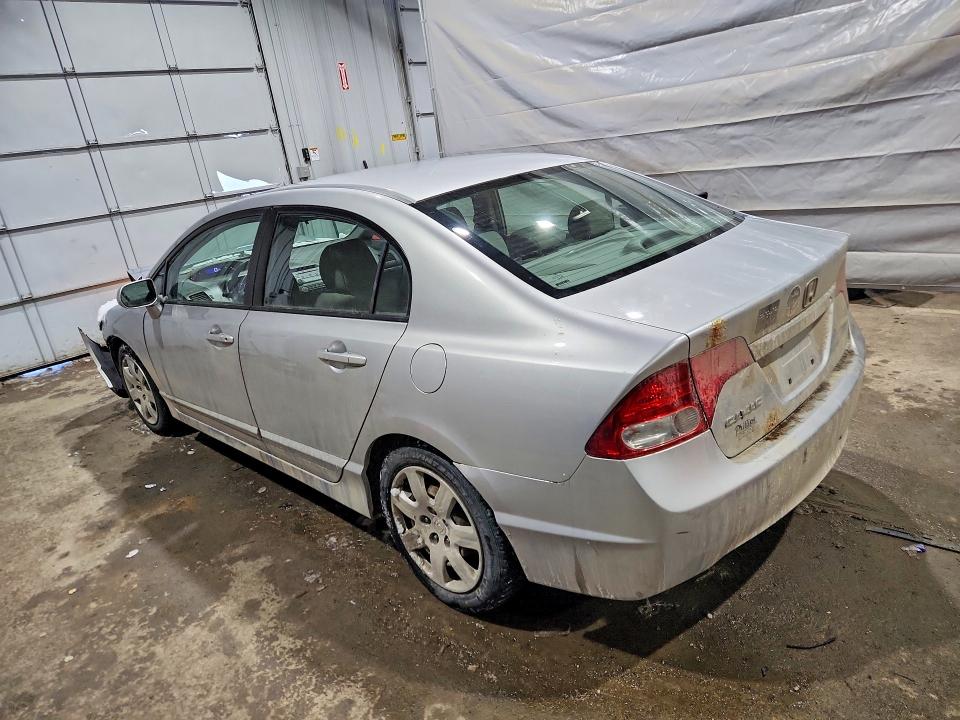Photo 2 from auction – 2010 HONDA CIVIC with VIN 2HGFA1F59AH303146
